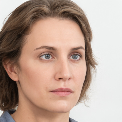 Neutral white young-adult female with medium  brown hair and grey eyes