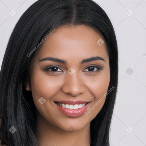 Joyful latino young-adult female with long  brown hair and brown eyes