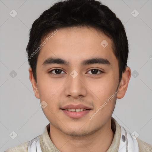 Joyful latino young-adult male with short  black hair and brown eyes