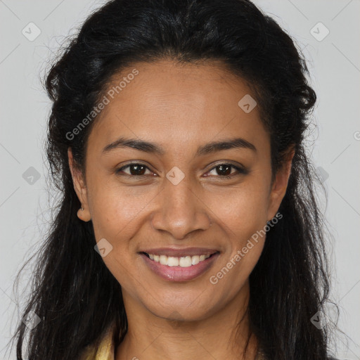 Joyful latino young-adult female with long  brown hair and brown eyes