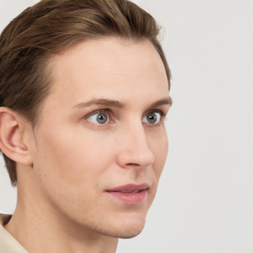 Neutral white young-adult male with short  brown hair and grey eyes