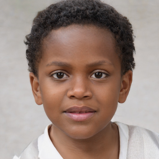 Joyful black child female with short  brown hair and brown eyes