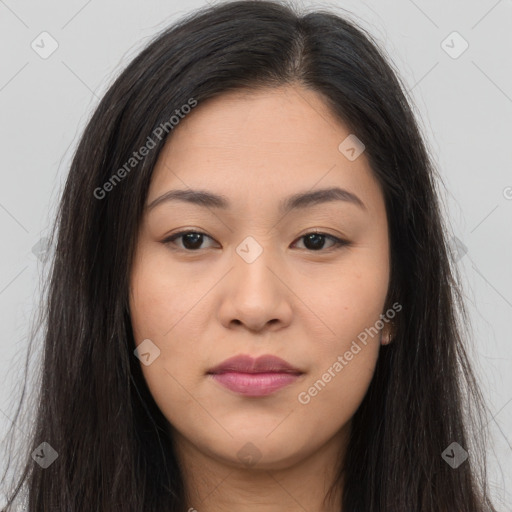 Joyful asian young-adult female with long  brown hair and brown eyes