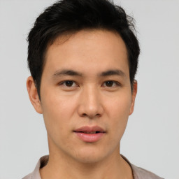 Neutral asian young-adult male with short  brown hair and brown eyes