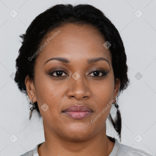 Joyful black young-adult female with medium  black hair and brown eyes