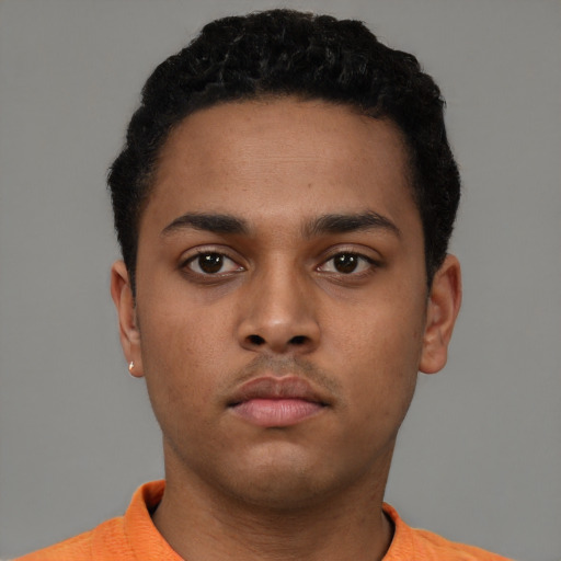 Neutral black young-adult male with short  black hair and brown eyes