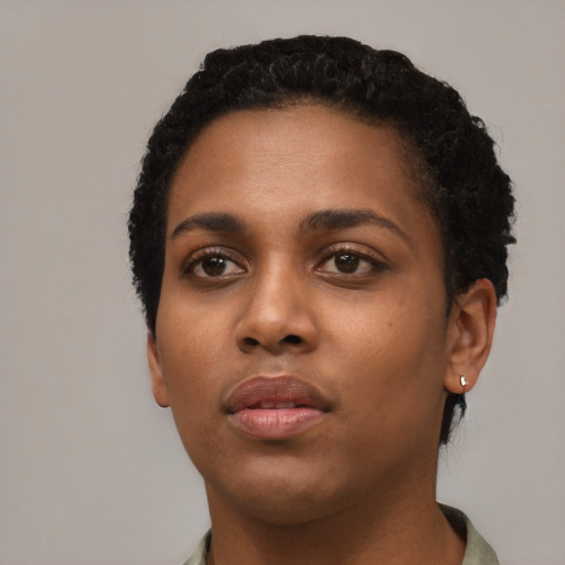 Neutral black young-adult female with short  black hair and brown eyes