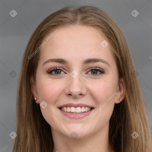 Joyful white young-adult female with long  brown hair and grey eyes