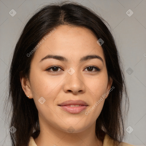 Joyful asian young-adult female with long  brown hair and brown eyes