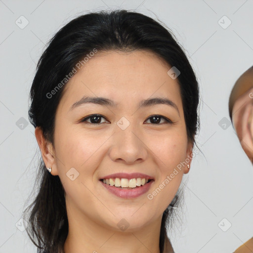 Joyful asian young-adult female with medium  brown hair and brown eyes