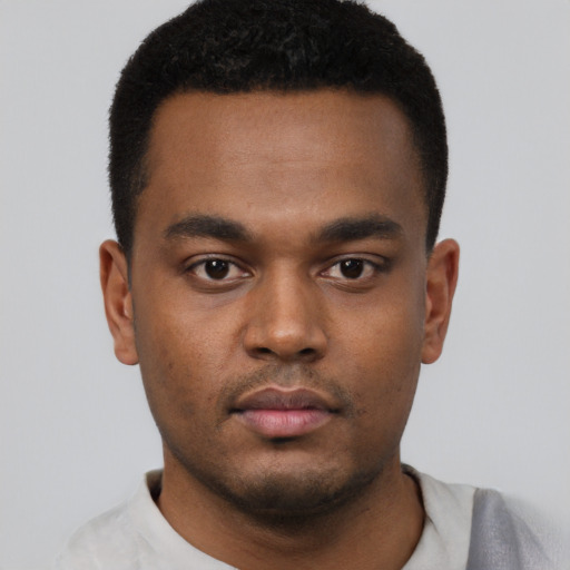 Neutral black young-adult male with short  black hair and brown eyes