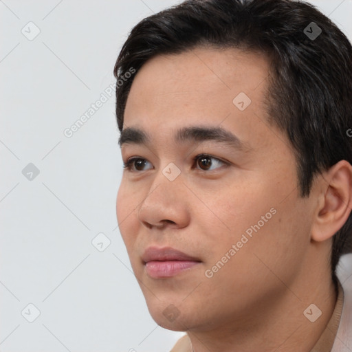 Neutral asian young-adult male with short  black hair and brown eyes