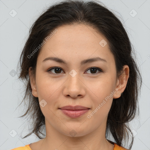 Joyful asian young-adult female with medium  brown hair and brown eyes