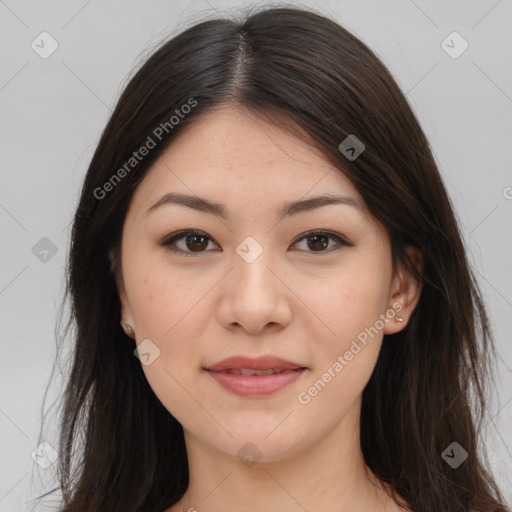 Joyful asian young-adult female with long  brown hair and brown eyes