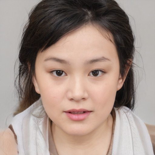 Joyful white child female with medium  brown hair and brown eyes