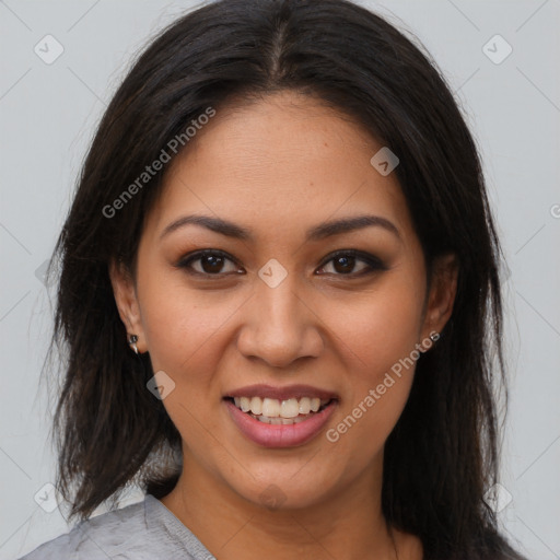 Joyful latino young-adult female with long  brown hair and brown eyes