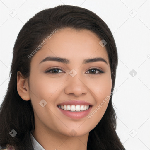 Joyful latino young-adult female with long  brown hair and brown eyes