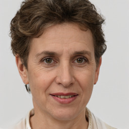 Joyful white adult female with short  brown hair and brown eyes