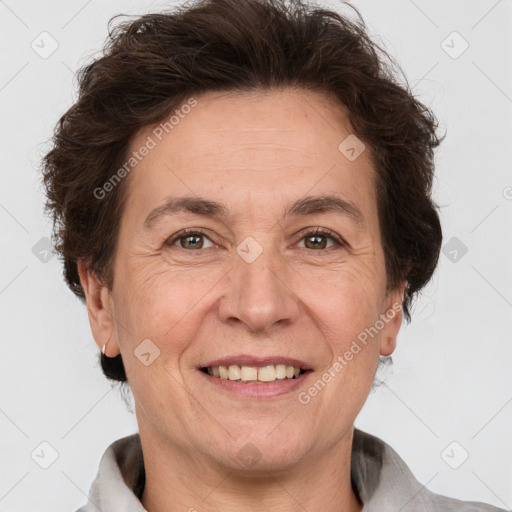 Joyful white adult female with short  brown hair and brown eyes