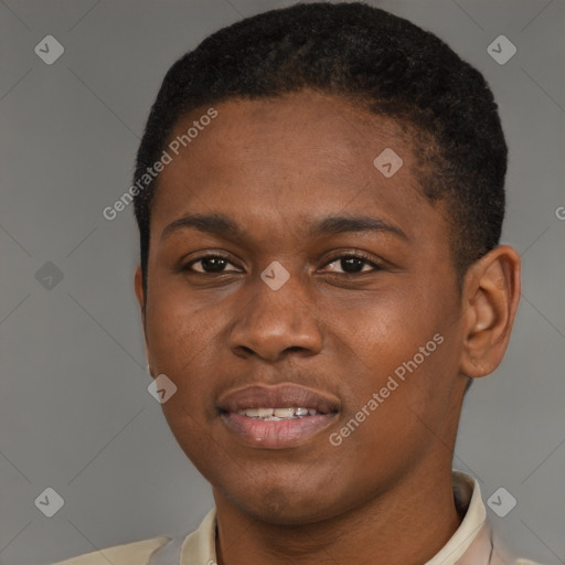 Joyful black young-adult male with short  brown hair and brown eyes