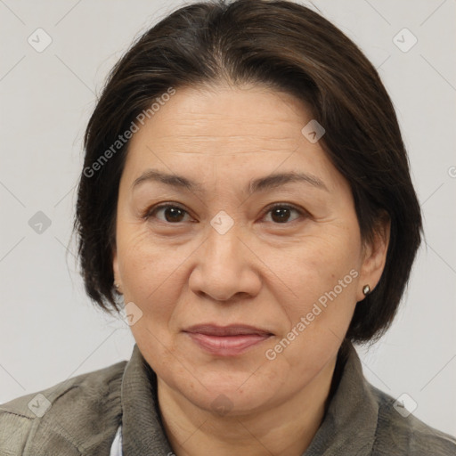 Joyful white adult female with medium  brown hair and brown eyes