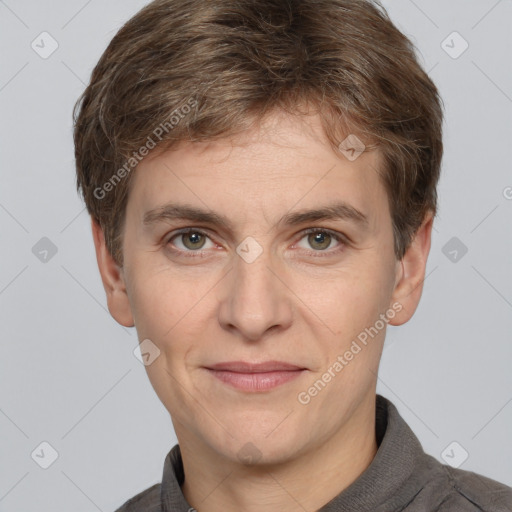 Joyful white adult male with short  brown hair and grey eyes