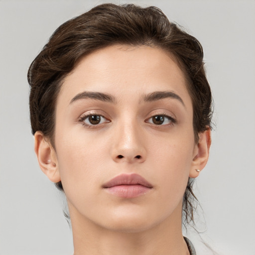 Neutral white young-adult female with medium  brown hair and brown eyes