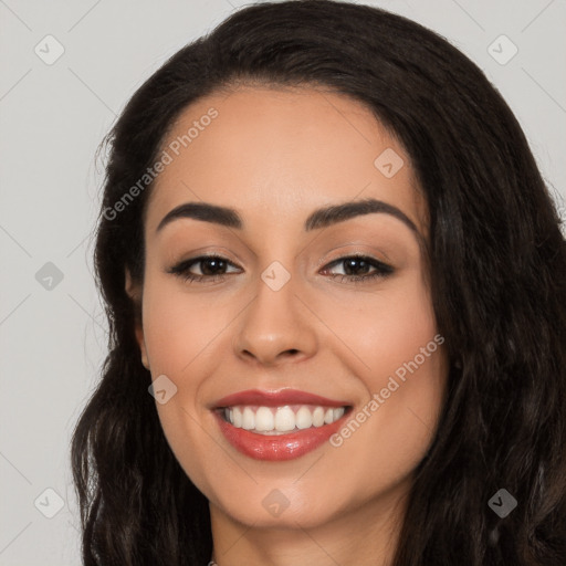 Joyful white young-adult female with long  black hair and brown eyes