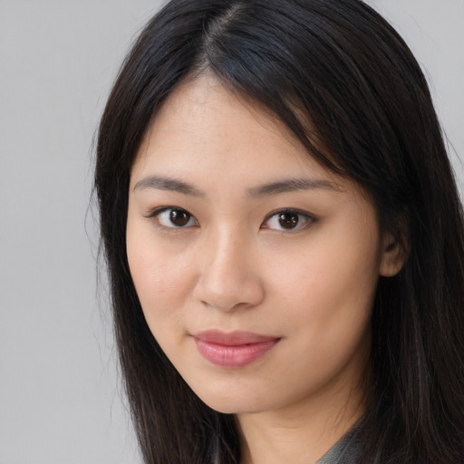Neutral asian young-adult female with long  brown hair and brown eyes