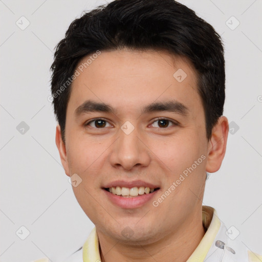 Joyful white young-adult male with short  black hair and brown eyes