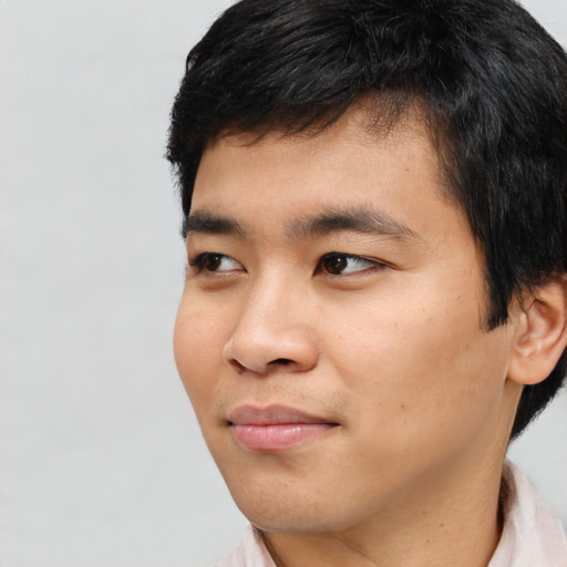 Neutral asian young-adult male with short  black hair and brown eyes