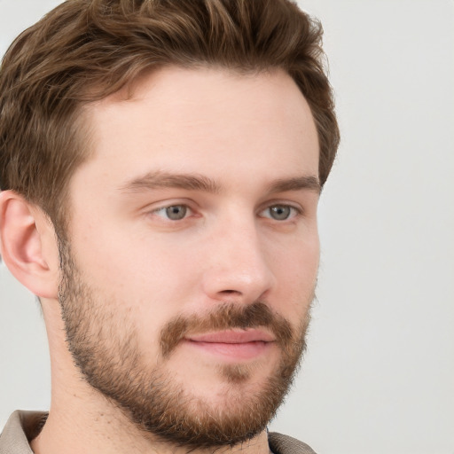 Neutral white young-adult male with short  brown hair and grey eyes