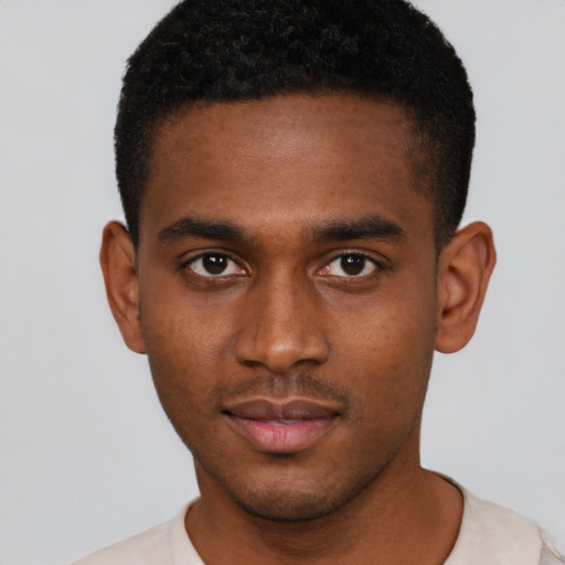 Neutral black young-adult male with short  brown hair and brown eyes