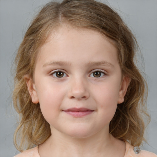 Joyful white child female with medium  brown hair and brown eyes