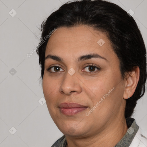 Joyful white adult female with medium  brown hair and brown eyes