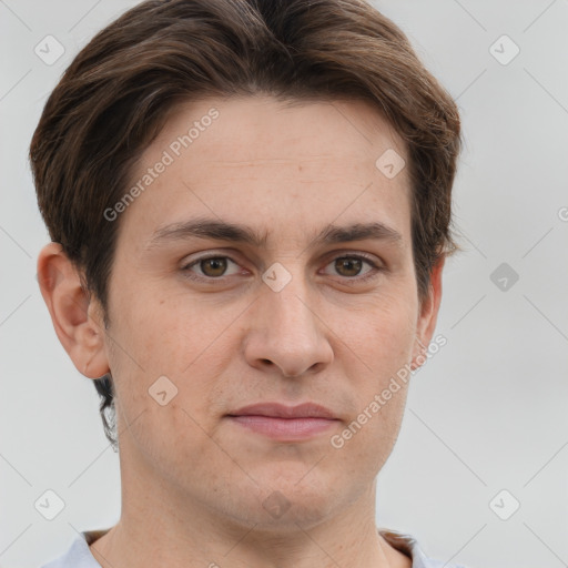 Joyful white adult male with short  brown hair and grey eyes