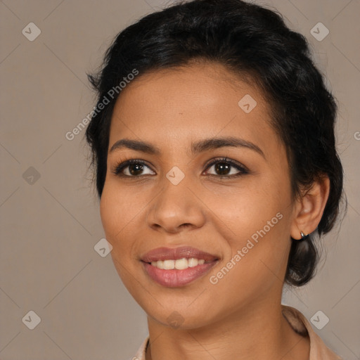 Joyful latino young-adult female with medium  brown hair and brown eyes