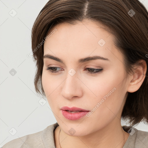 Neutral white young-adult female with medium  brown hair and brown eyes