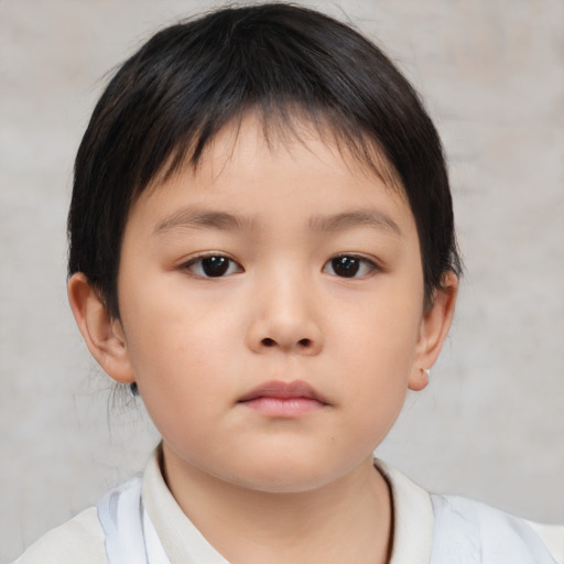 Neutral asian child female with short  brown hair and brown eyes