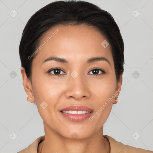 Joyful latino young-adult female with short  brown hair and brown eyes