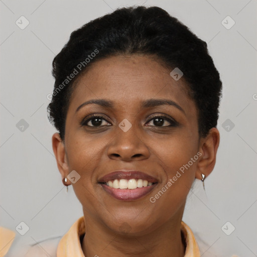 Joyful latino young-adult female with short  black hair and brown eyes