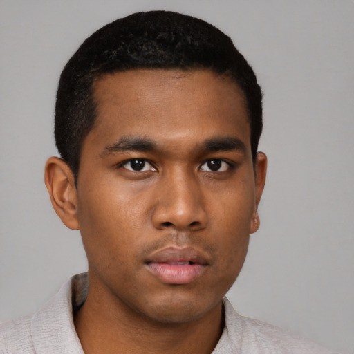 Neutral black young-adult male with short  black hair and brown eyes