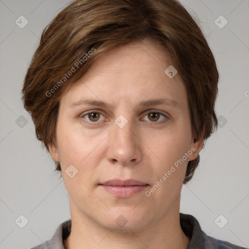 Joyful white adult female with short  brown hair and grey eyes