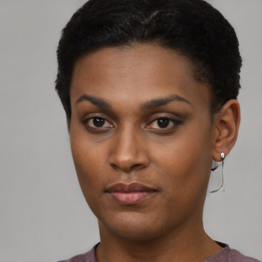 Neutral black young-adult female with short  black hair and brown eyes