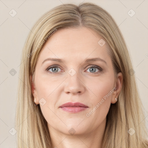 Joyful white adult female with long  brown hair and grey eyes