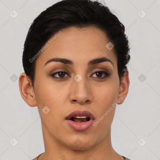 Joyful latino young-adult female with short  brown hair and brown eyes