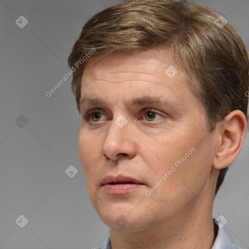 Neutral white adult male with short  brown hair and brown eyes