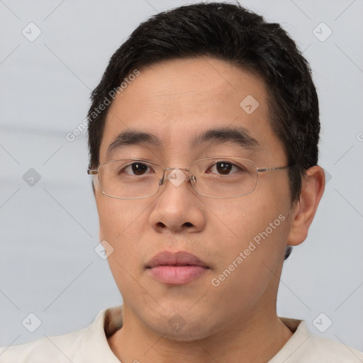 Neutral asian young-adult male with short  brown hair and brown eyes