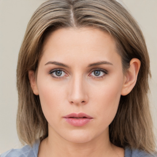 Neutral white young-adult female with medium  brown hair and grey eyes