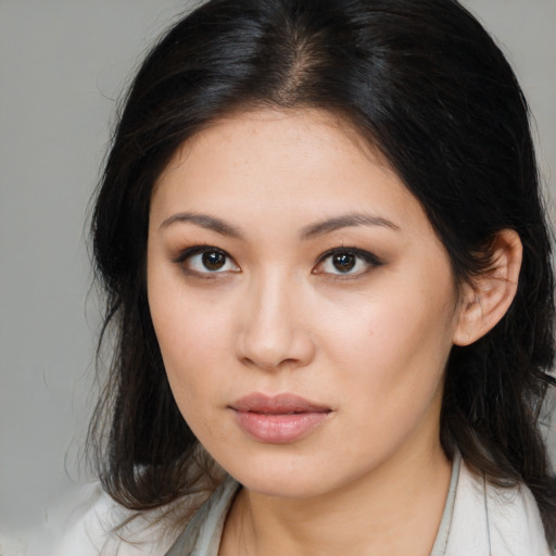 Neutral asian young-adult female with medium  brown hair and brown eyes